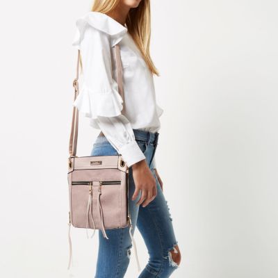 Light pink zip front mini messenger bag